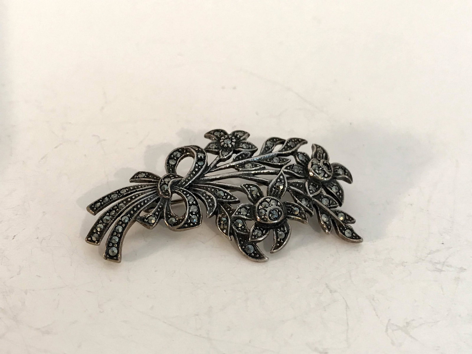 Vintage Sterling Flower Marcasite Brooch: Vintage Sterling Flower Marcasite Brooch Please view all photos as they are part of the description and condition of this Item, Feel free to contact me with questions or picture requests! Used Item AS