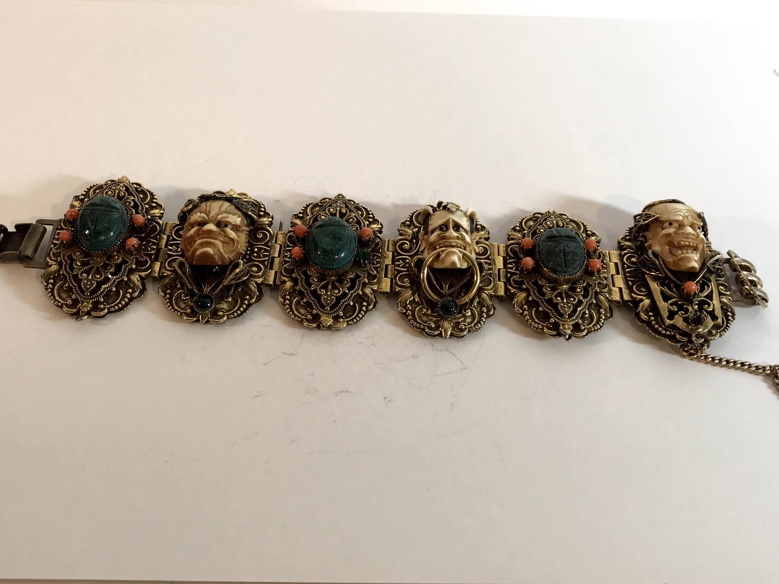 Vintage Celluloid Demon Devil Mask Bracelet Rare 2 3/4": Vintage Celluloid Demon Devil Mask Bracelet Rare 2 3/4" Please view all photos as they are part of the description and condition of this Item, Feel free to contact me with questions or picture request