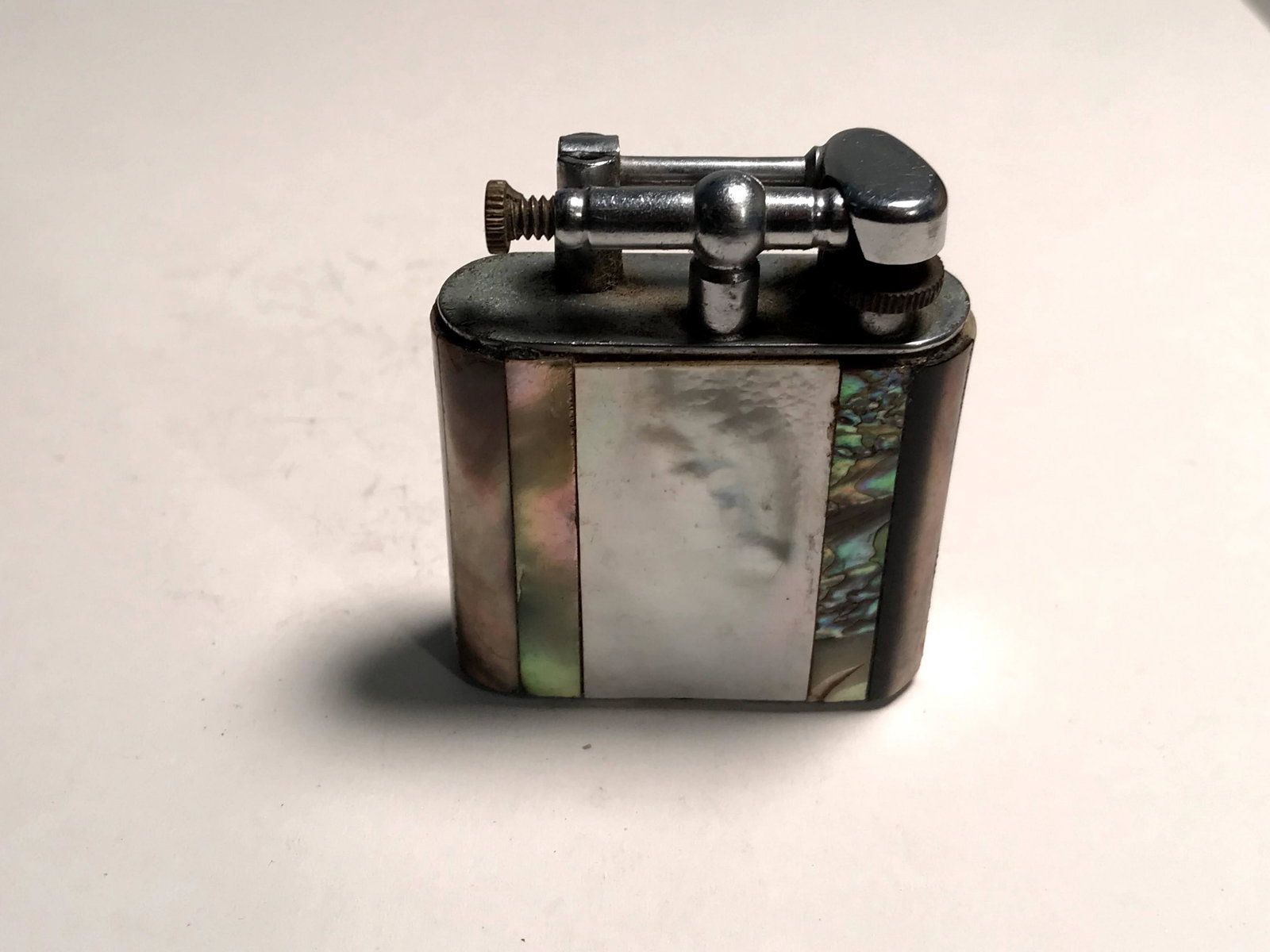 Vintage Mother Of Pearl Golden Wheel Lift Arm Pocket: Vintage Mother Of Pearl Golden Wheel Lift Arm Pocket Lighter Please view all photos as they are part of the description and condition of this Item, Feel free to contact me with questions or picture re