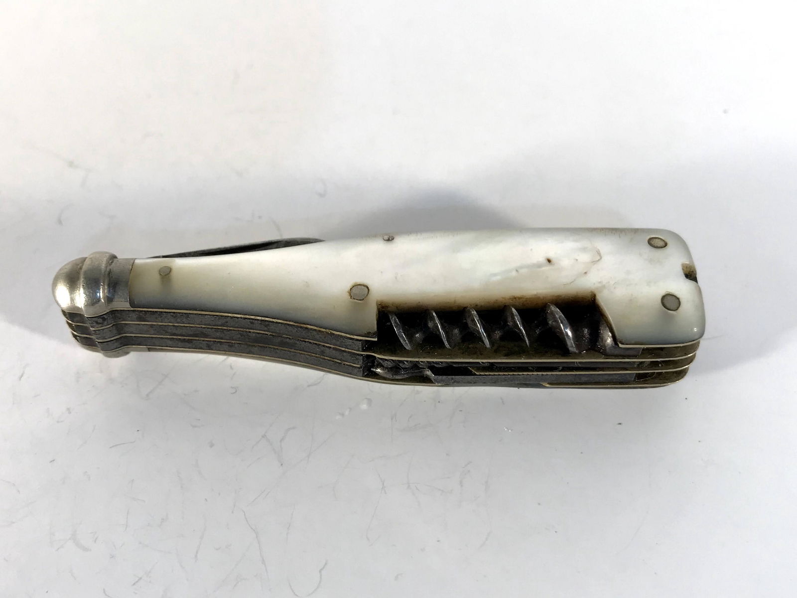 Rare Henry Sears and son 8 blade folding knife 1865: Henry Sears and son 8 blade folding knife 1865 champagne coke bottle its a little gem missing a small piece at bottomPlease view all photos as they are part of the description and condition of this It