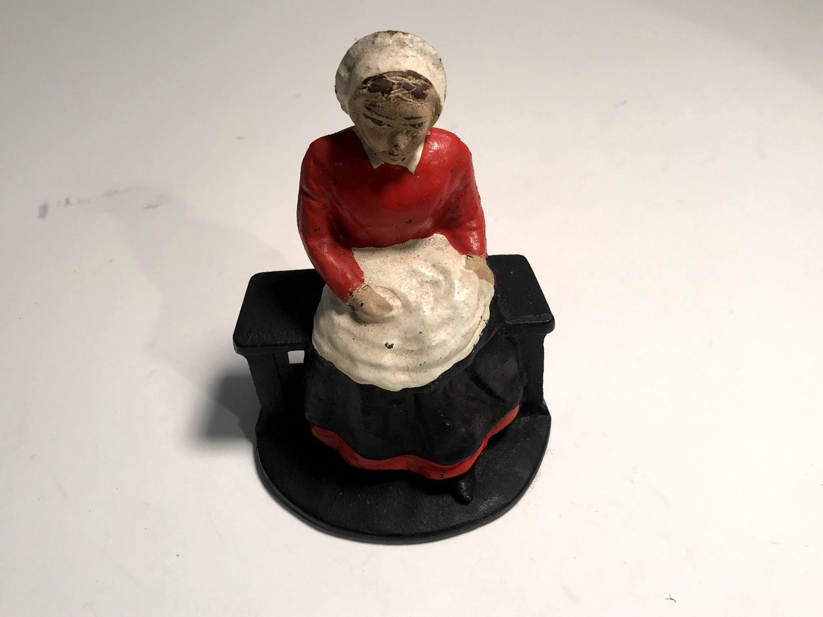 Vintage Cast Iron Maid: Vintage Cast Iron Maid Please view all photos as they are part of the description and condition of this Item, Feel free to contact me with questions or picture requests! Used Item AS IS