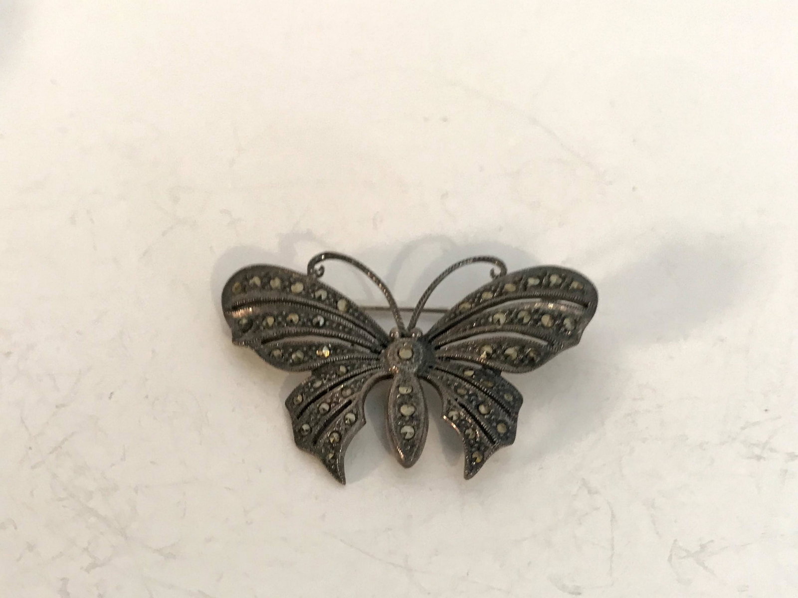 Vintage Sterling Butterfly Marcasite Brooch: Vintage Sterling Butterfly Marcasite Brooch Please view all photos as they are part of the description and condition of this Item, Feel free to contact me with questions or picture requests! Used Item