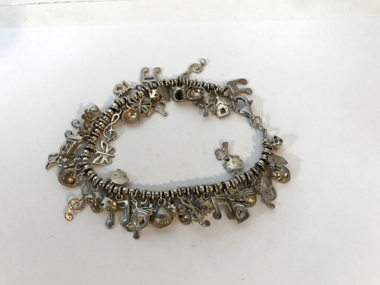 Vintage Sterling Silver Charm Bracelet Loaded over 50 (1 of 1)