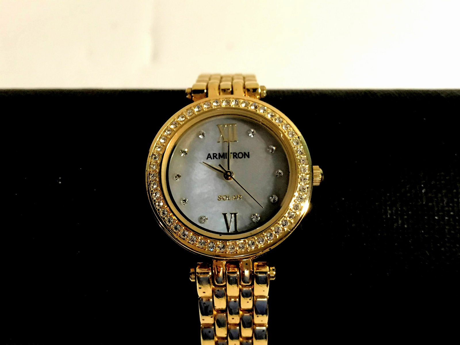 Armitron Women's Solar Crystal Watch Working!!!: Armitron Women's Solar Crystal Watch Working!!! Please view all photos as they are part of the description and condition of this Item, Feel free to contact me with questions or picture requests! Used 