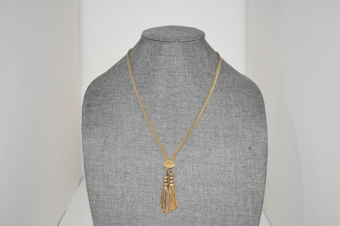 Vintage MONET Gold Tone Tassel Pendant Necklace 22": Vintage MONET Gold Tone Tassel Pendant Necklace 22" Please view all photos as they are part of the description and condition of this Item, Feel free to contact me with questions or picture requests! U