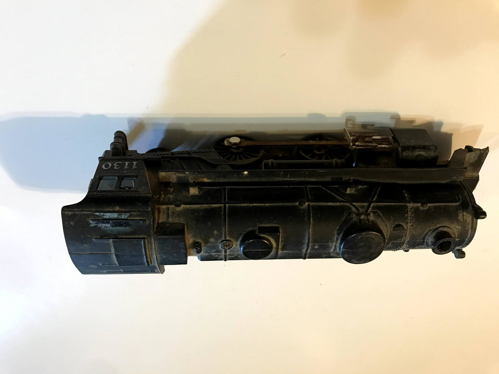 Vintage Post War Lionel Locomotive 1130 Black train: Vintage Post War Lionel Locomotive 1130 Black train Please view all photos as they are part of the description and condition of this Item, Feel free to contact me with questions or picture requests!.