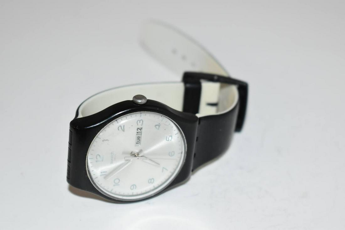 Menâ€™s Vintage Swatch SR1130SW Silver: Menâ€™s Vintage Swatch SR1130SW Silver works great !!!Please view all photos as they are part of the description and condition of this Item, Feel free to contact me with questions or picture requ