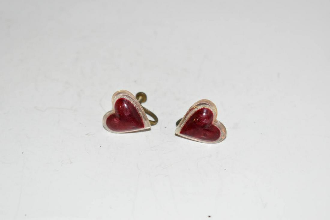 Vintage Arylic Heart screwback Earrings: Vintage Arylic Heart screwback Earrings Please view all photos as they are part of the description and condition of this Item, Feel free to contact me with questions or picture requests! Used Item AS