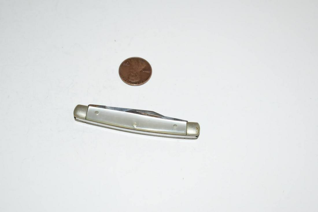 Vintage Sabre Faux Mother of Pearl Handle Pocket Knife: Vintage Sabre Faux Mother of Pearl Handle Pocket Knife Please view all photos as they are part of the description and condition of this Item, Feel free to contact me with questions or picture requests