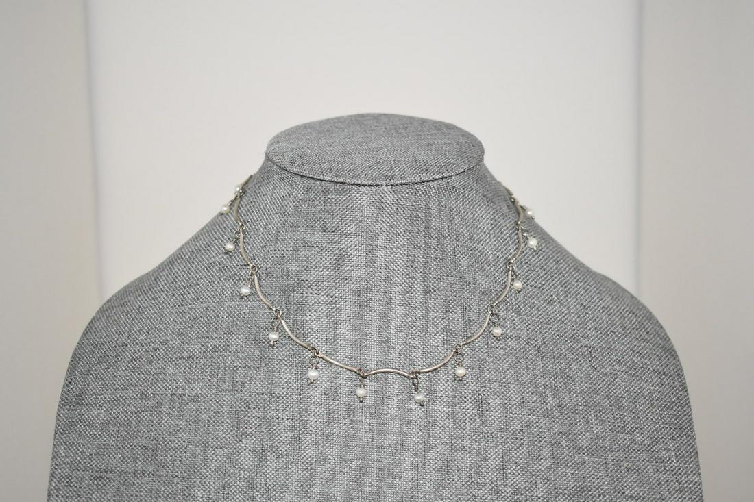 Vintage Carolee sterling silver Pearl choker necklace: Vintage Carolee sterling silver Pearl choker necklace 15"Please view all photos as they are part of the description and condition of this Item, Feel free to contact me with questions or picture reques