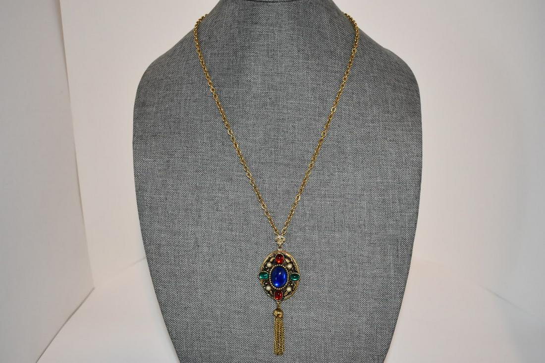 Vintage Goldtone Colorful Locket Necklace 24": Vintage Goldtone Colorful Locket Necklace 24" Please view all photos as they are part of the description and condition of this Item, Feel free to contact me with questions or picture requests! Used It