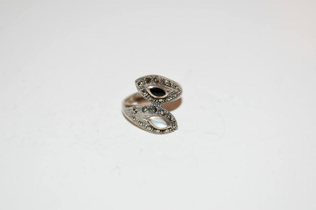 Vintage Marcasite Sterling Ring onyx mother of Pearl 6: Vintage Marcasite Sterling Ring onyx mother of Pearl 6Please view all photos as they are part of the description and condition of this Item, Feel free to contact me with questions or picture requests!