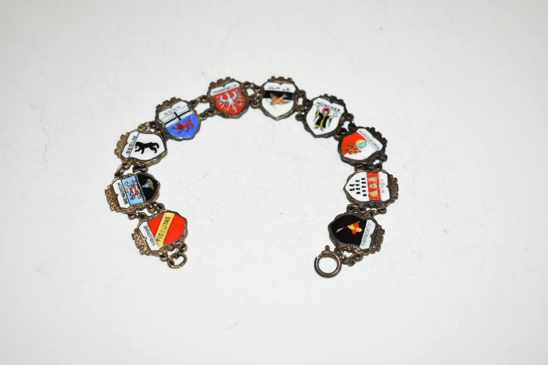 Vintage 800 REU Enamel Charms Travel Shield Bracelet 2: Vintage 800 REU Enamel Charms Travel Shield Bracelet 2 1/4" Please view all photos as they are part of the description and condition of this Item, Feel free to contact me with questions or picture req