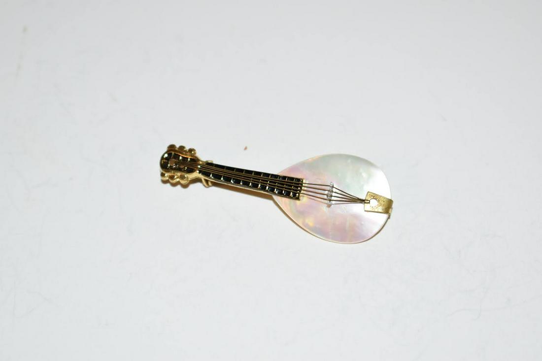Vintage Mother of Pearl Banjo Brooch 2 1/8 in Made in Germany: Vintage Mother of Pearl Banjo Brooch 2 1/8 in Made in Germany Please view all photos as they are part of the description and condition of this Item, Feel free to contact me with questions or picture r