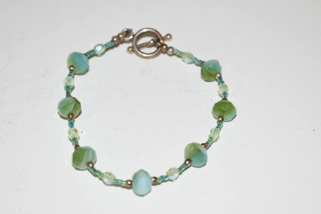 Vintage Sterling Silver Green Bead Bracelet 2": Vintage Sterling Silver Green Bead Bracelet 2"Please view all photos as they are part of the description and condition of this Item, Feel free to contact me with questions or picture requests! Used It
