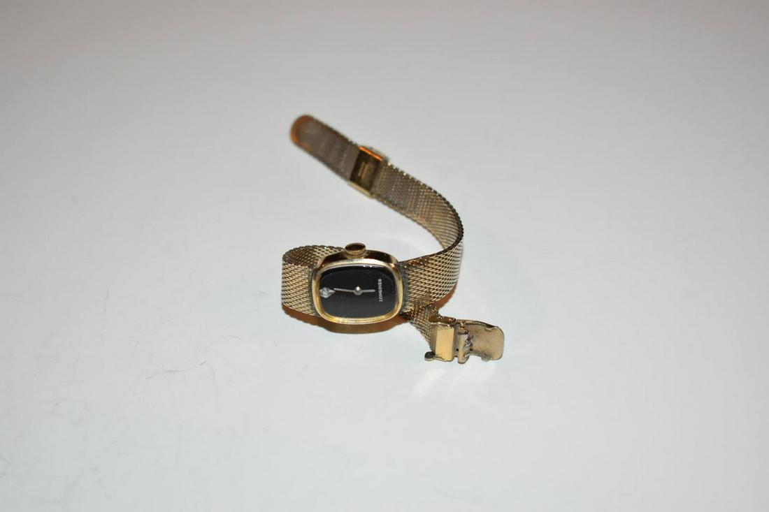 Vintage Women's Longines Watch Black Dial 10K Gold Filled Works Great.: Vintage Women's Longines Watch Black Dial 10K Gold Filled Works Great. Please view all photos as they are part of the description and condition of this Item, Feel free to contact me with questions or 