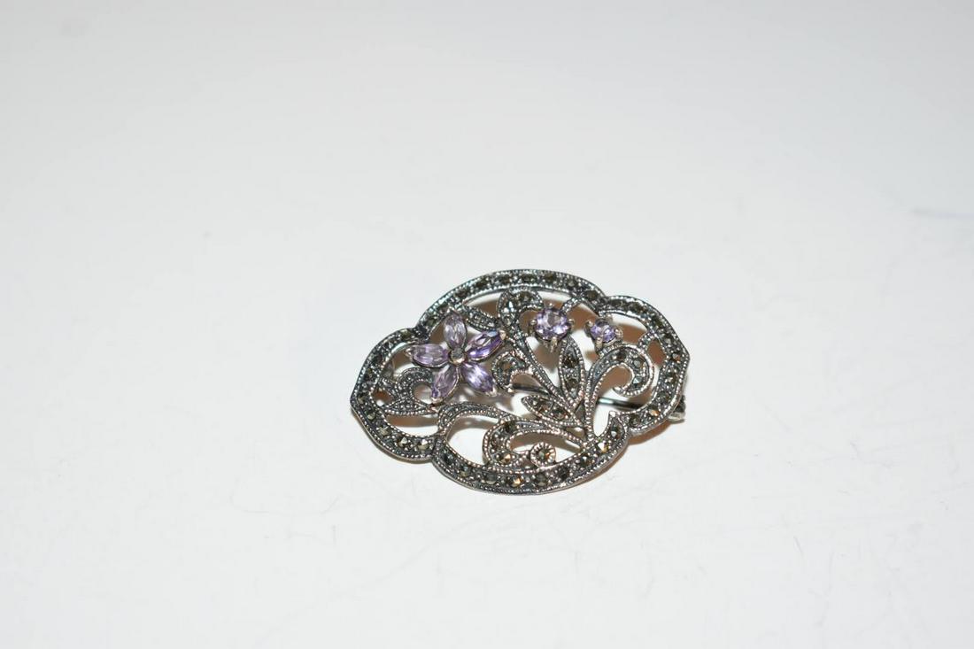 Vintage Sterling Silver Marcasite Amethyst Brooch: Vintage Sterling Silver Marcasite Amethyst Brooch Please view all photos as they are part of the description and condition of this Item, Feel free to contact me with questions or picture requests! Use