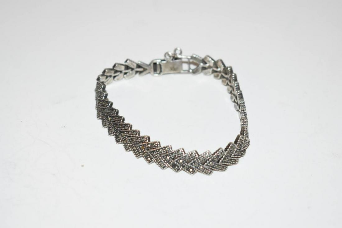 Vintage Sterling Silver Marcasite TH Bracelet 7 inch missing stones: Vintage Sterling Silver Marcasite TH Bracelet 7 inch missing stones Please view all photos as they are part of the description and condition of this Item, Feel free to contact me with questions or pic
