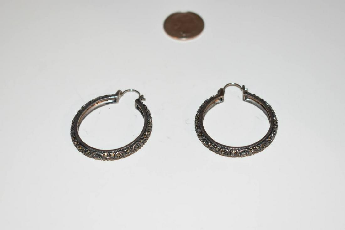 Vintage Sterling Silver Marcasite Hoop Earring: Vintage Sterling Silver Marcasite Hoop Earring Please view all photos as they are part of the description and condition of this Item, Feel free to contact me with questions or picture requests! Used I