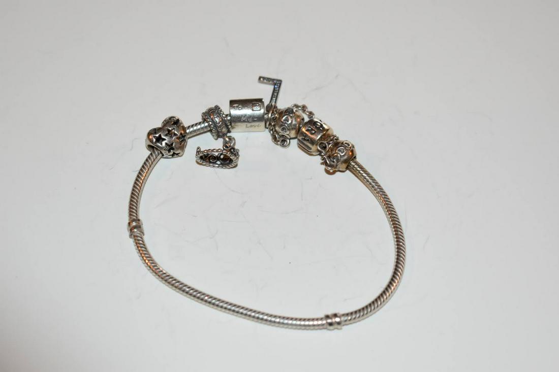 Authentic Vintage Pandora Bracelet With Authentic Pandora Charms: Authentic Vintage Pandora Bracelet With Authentic Pandora Charms Please view all photos as they are part of the description and condition of this Item, Feel free to contact me with questions or pictur