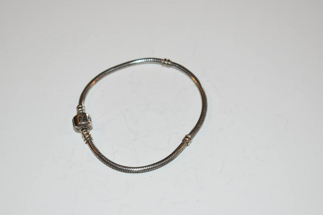 Authentic Vintage Pandora Bracelet: Authentic Vintage Pandora Bracelet Please view all photos as they are part of the description and condition of this Item, Feel free to contact me with questions or picture requests! Used Item AS IS