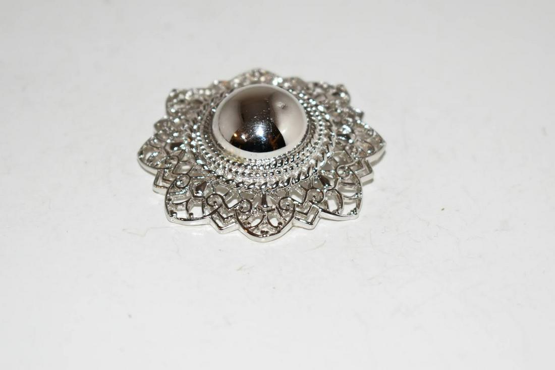 Vintage Silvertone Trifari Brooch 2 1/4": Vintage Silvertone Trifari Brooch 2 1/4" Please view all photos as they are part of the description and condition of this Item, Feel free to contact me with questions or picture requests! Used Item AS
