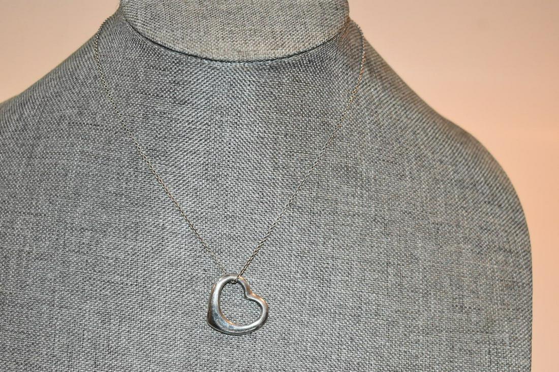 Vintage Tiffany & Co. Sterling Silver .925 Elsa Peretti Open Heart Pendant Necklace 16 in: Vintage Tiffany & Co. Sterling Silver .925 Elsa Peretti Open Heart Pendant Necklace 16 in Please view all photos as they are part of the description and condition of this Item, Feel free to contact me