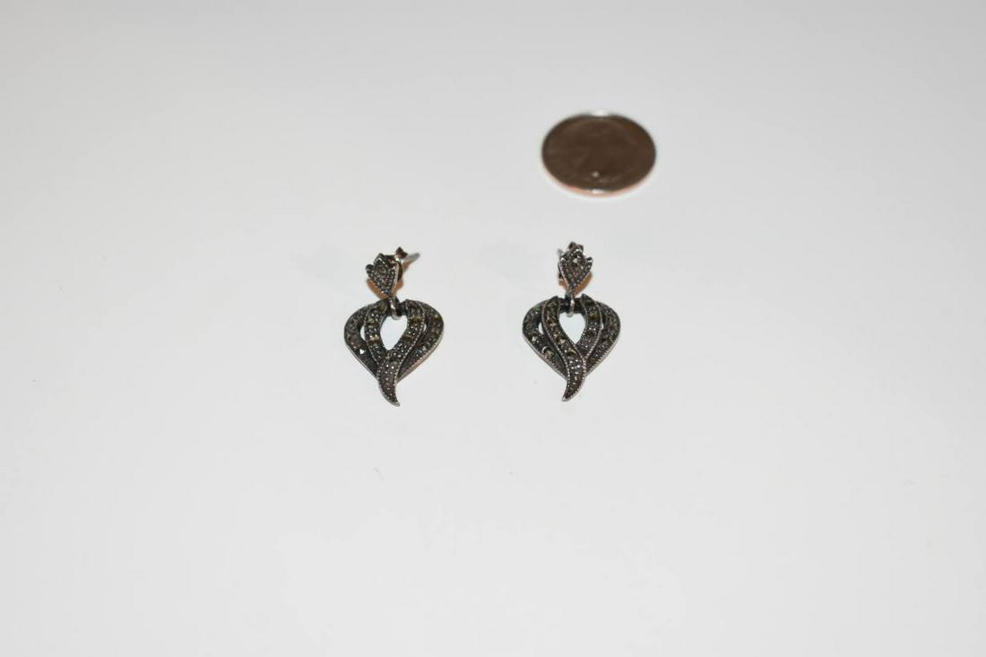 Vintage Sterling Silver Marcasite Earring: Vintage Sterling Silver Marcasite Earring Please view all photos as they are part of the description and condition of this Item, Feel free to contact me with questions or picture requests! Used Item A