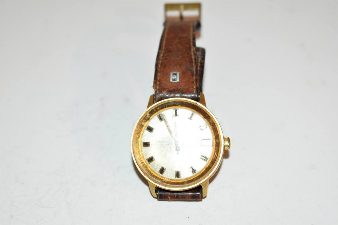 Vtg 1973 TIMEX Day Date Manual Wrist Watch Caliber 27 35mm works great!!!: Vtg 1973 TIMEX Day Date Manual Wrist Watch Caliber 27 35mm works great!!! Please view all photos as they are part of the description and condition of this Item, Feel free to contact me with questions 