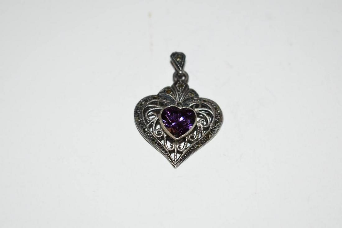 Vintage Sterling Silver Marcasite Amethyst Pendant: Vintage Sterling Silver Marcasite Amethyst Pendant Please view all photos as they are part of the description and condition of this Item, Feel free to contact me with questions or picture requests! Us