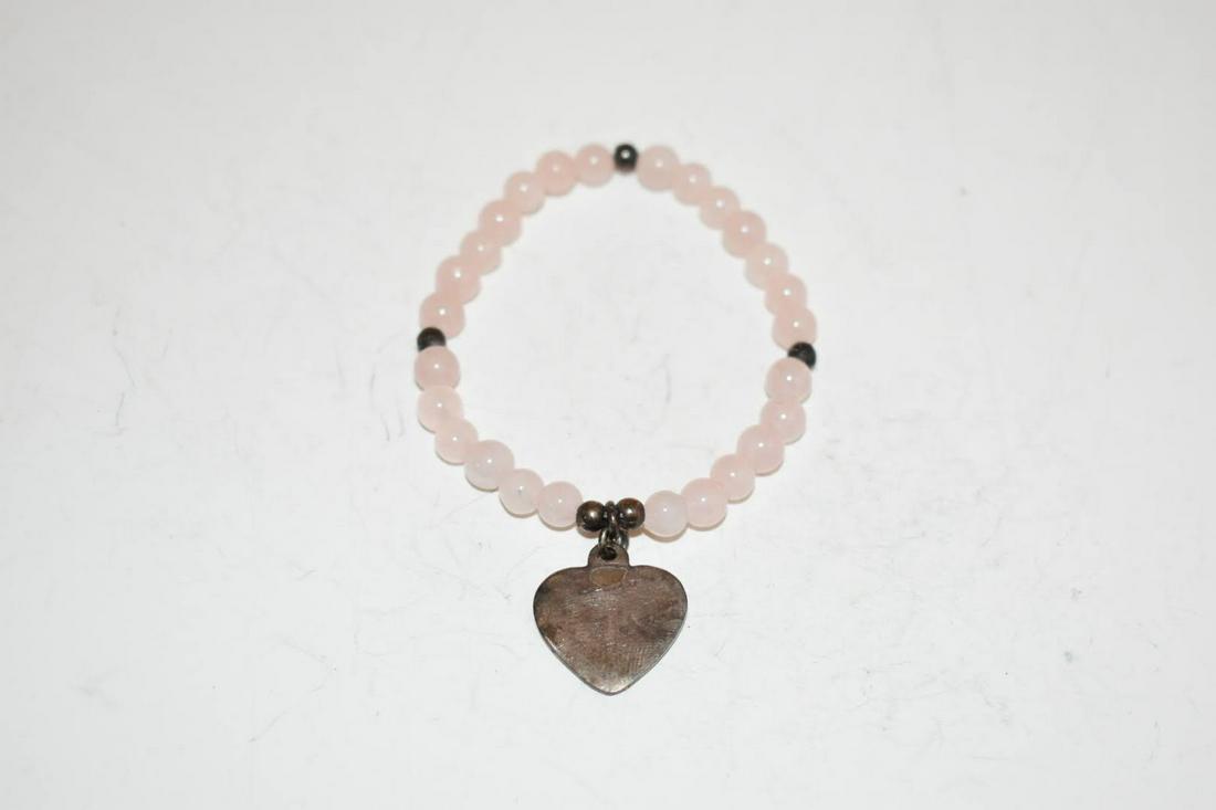 Vintage Sterling Silver Pink Avon Bracelet stretch: Vintage Sterling Silver Pink Avon Bracelet stretch Please view all photos as they are part of the description and condition of this Item, Feel free to contact me with questions or picture requests! Us