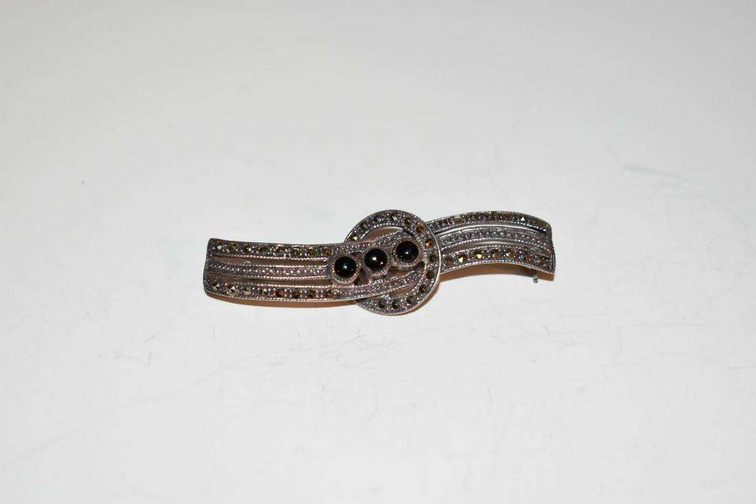 Vintage Sterling Silver Marcasite onyx Brooch: Vintage Sterling Silver Marcasite onyx Brooch Please view all photos as they are part of the description and condition of this Item, Feel free to contact me with questions or picture requests! Used It