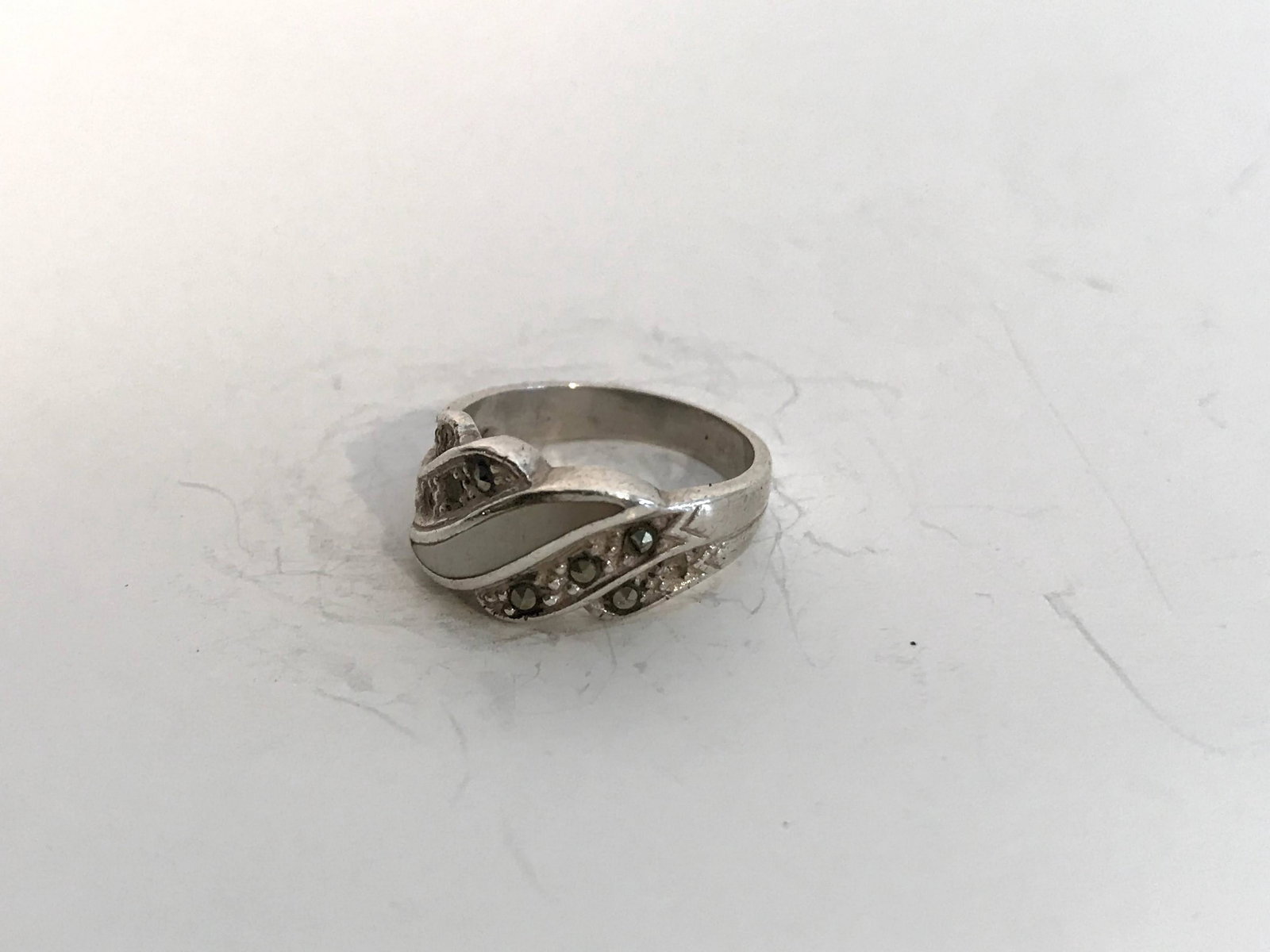 Vintage Sterling Silver Mother of pearl Marcasite Ring: Vintage Sterling Silver Mother of pearl Marcasite Ring 4.8 Please view all photos as they are part of the description and condition of this Item, Feel free to contact me with questions or picture requ
