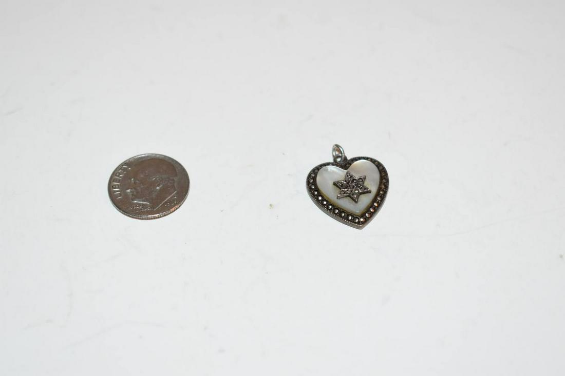 Vintage Sterling Silver Star of David heart marcasite Pendant: Vintage Sterling Silver Star of David heart marcasite Pendant Please view all photos as they are part of the description and condition of this Item, Feel free to contact me with questions or picture r