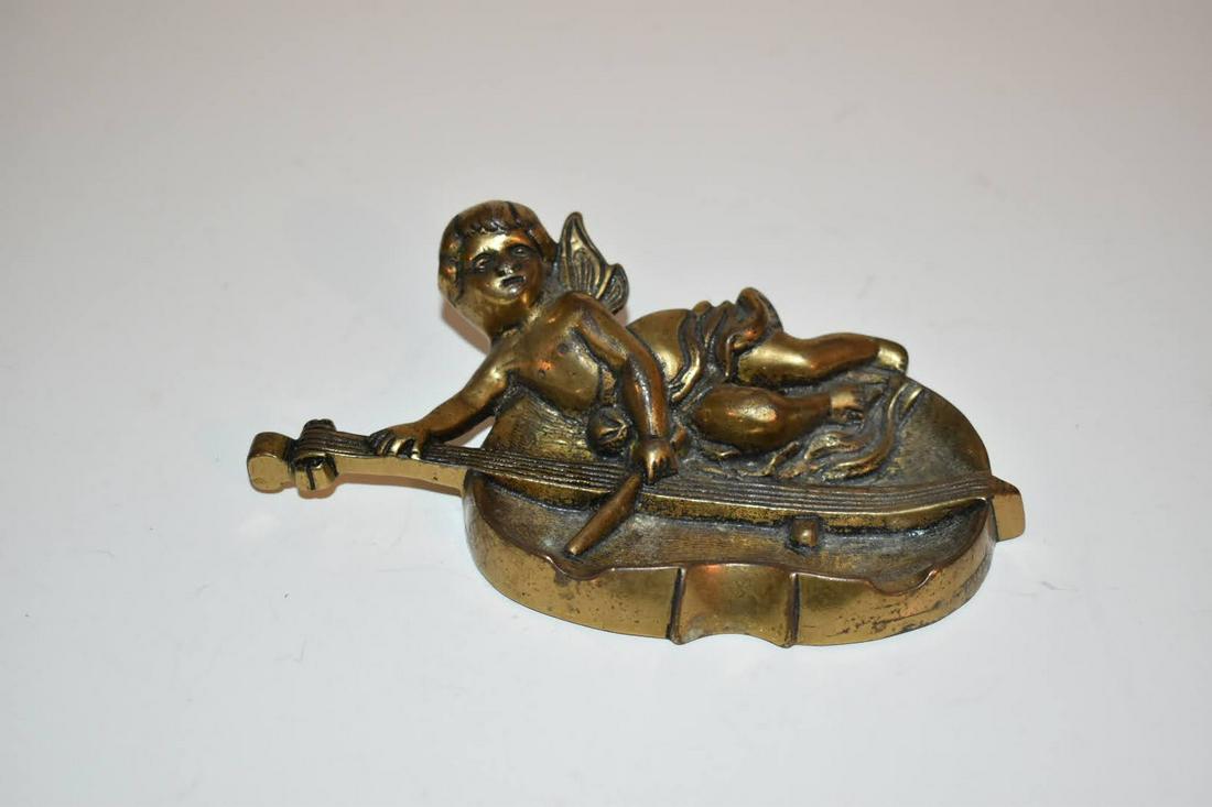 Vtg Brass Cigar/Cigarette Ashtray Cherub: Vtg Brass Cigar/Cigarette Ashtray Cherub Please view all photos as they are part of the description and condition of this Item, Feel free to contact me with questions or picture requests! Used Item AS
