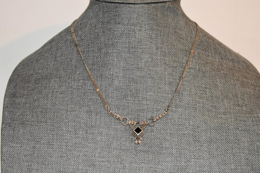 Vintage Sterling Silver Onyz Marcasite Necklace pendant 17": Vintage Sterling Silver Onyz Marcasite Necklace pendant 17" Please view all photos as they are part of the description and condition of this Item, Feel free to contact me with questions or picture req