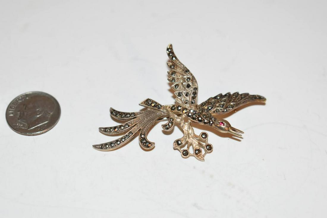 Vintage Sterling Silver marcasite bird Brooch: Vintage Sterling Silver marcasite bird Brooch Please view all photos as they are part of the description and condition of this Item, Feel free to contact me with questions or picture requests! Used It