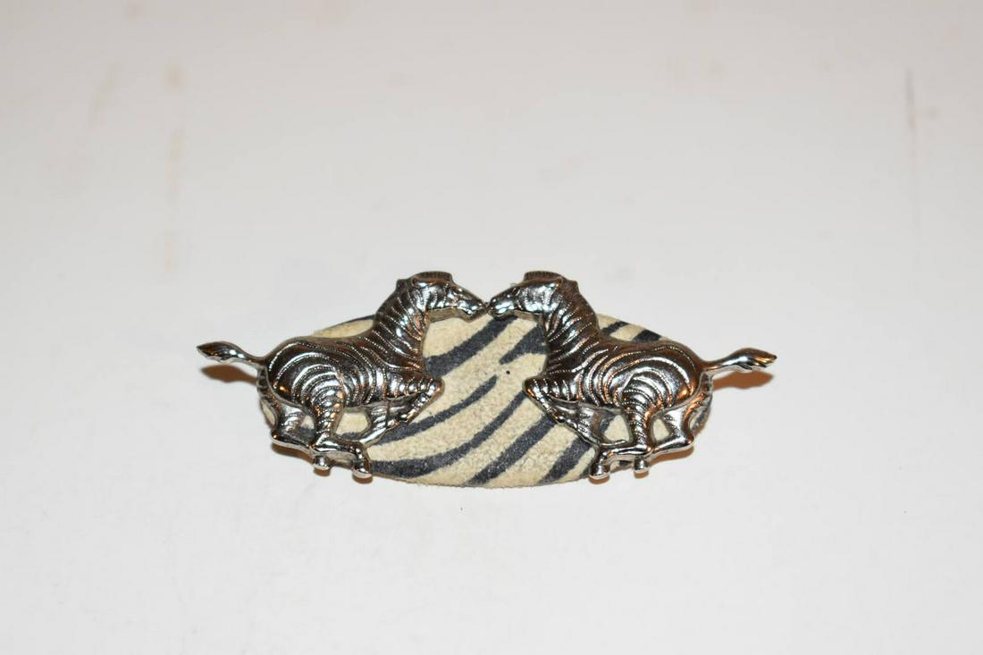 Vintage double Zebra Brooch: Vintage double Zebra Brooch Please view all photos as they are part of the description and condition of this Item, Feel free to contact me with questions or picture requests! Used Item AS IS