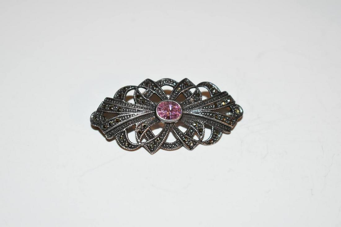 Vintage Sterling Silver Marcasite Amethyst Brooch: Vintage Sterling Silver Marcasite Amethyst Brooch Please view all photos as they are part of the description and condition of this Item, Feel free to contact me with questions or picture requests! Use