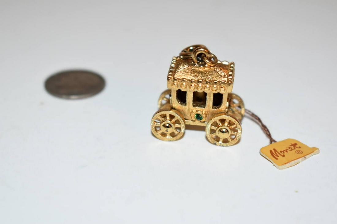 vintage monet wagon pendant: vintage monet wagon pendant Please view all photos as they are part of the description and condition of this Item, Feel free to contact me with questions or picture requests! Used Item AS IS