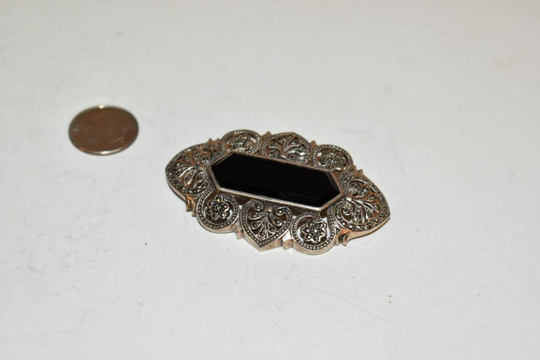 Vintage sterling Silver Black Onyx Marcasite Filigree Pin Brooch: Vintage sterling Silver Black Onyx Marcasite Filigree Pin Brooch Please view all photos as they are part of the description and condition of this Item, Feel free to contact me with questions or pictur