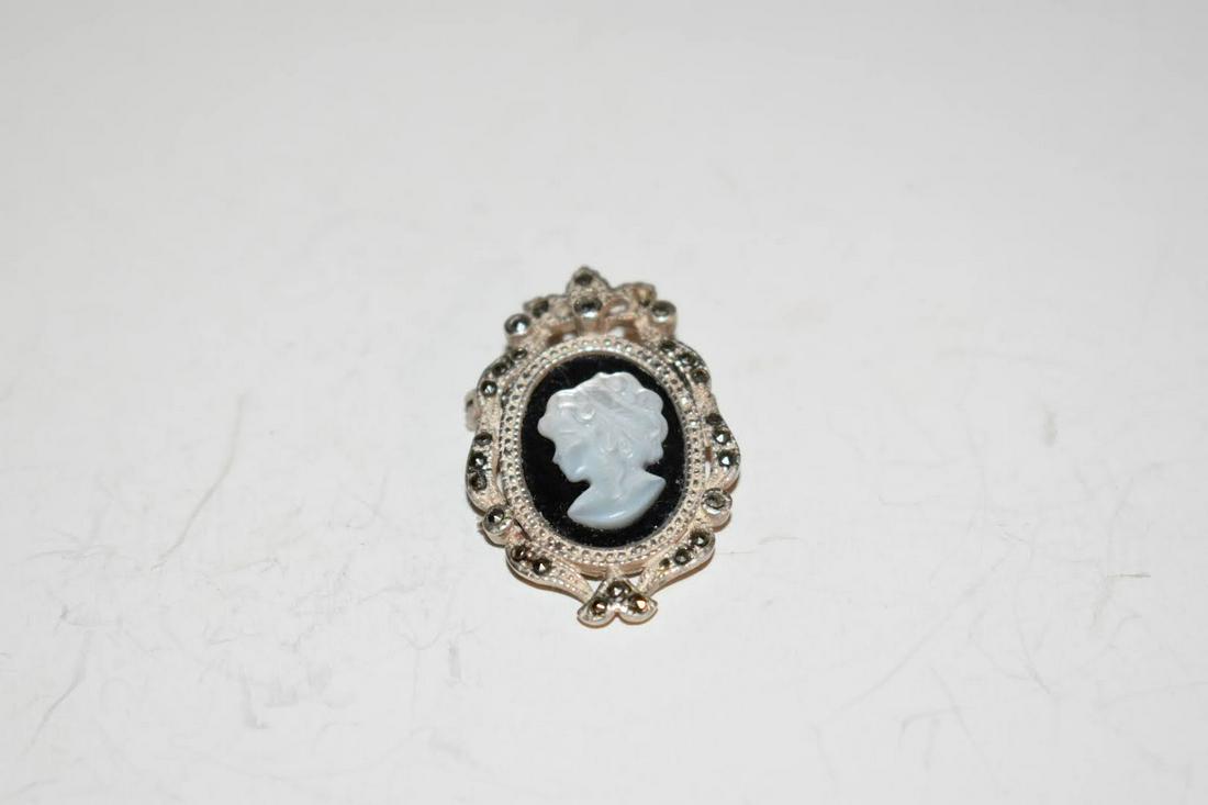 Vintage Sterling Silver Marcasite Cameo Brooch: Vintage Sterling Silver Marcasite Cameo Brooch Please view all photos as they are part of the description and condition of this Item, Feel free to contact me with questions or picture requests! Used I