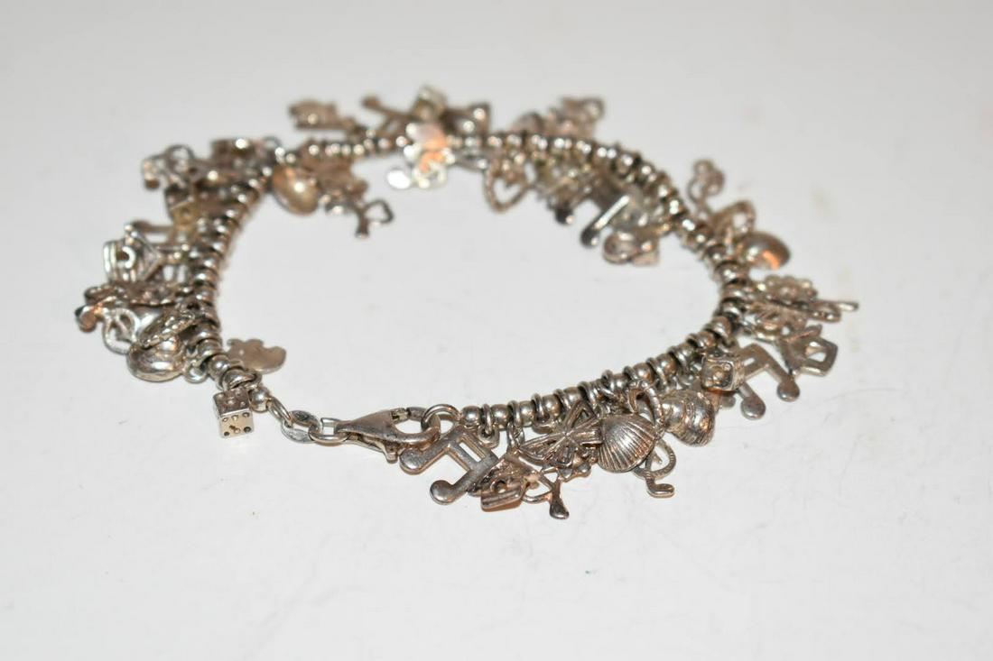 Vintage Sterling Silver Charm Bracelet LOADED 50 Great Charms 7": Vintage Sterling Silver Charm Bracelet LOADED 50 Great Charms 7" Please view all photos as they are part of the description and condition of this Item, Feel free to contact me with questions or pictur