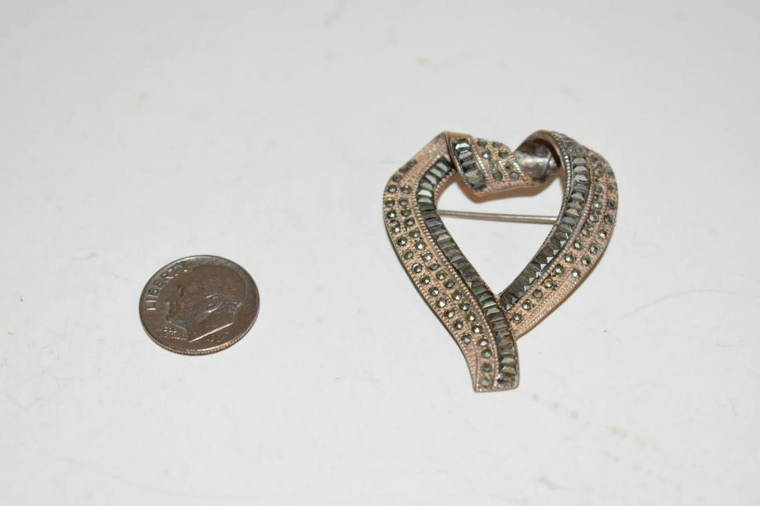 Vintage Sterling Silver marcasite Brooch: Vintage Sterling Silver marcasite Brooch Please view all photos as they are part of the description and condition of this Item, Feel free to contact me with questions or picture requests! Used Item AS