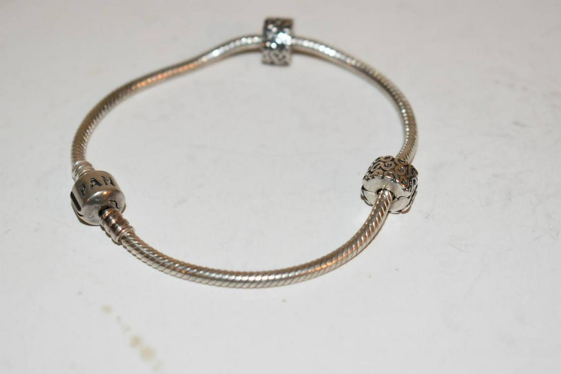 Vintage Sterling Silver Pandora Bracelet 8 inch: Vintage Sterling Silver Pandora Bracelet 8 inch Please view all photos as they are part of the description and condition of this Item, Feel free to contact me with questions or picture requests! Used 