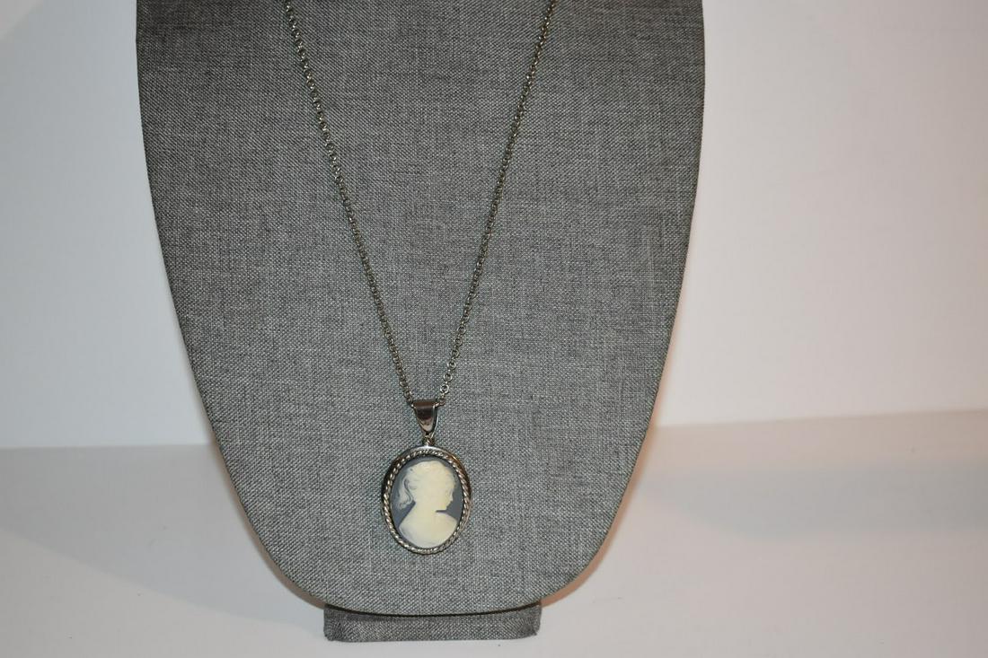 Vintage blue cameo locket Necklace 30": Vintage blue cameo locket Necklace 30" Please view all photos as they are part of the description and condition of this Item, Feel free to contact me with questions or picture requests! Used Item AS I