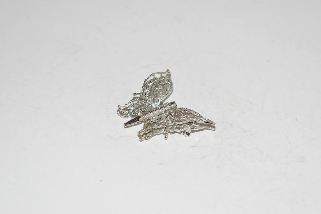 Vintage Silvertone Monet Filigree Butterfly Brooch 1: Vintage Silvertone Monet Filigree Butterfly Brooch 1 1/2" Please view all photos as they are part of the description and condition of this Item, Feel free to contact me with questions or picture reque