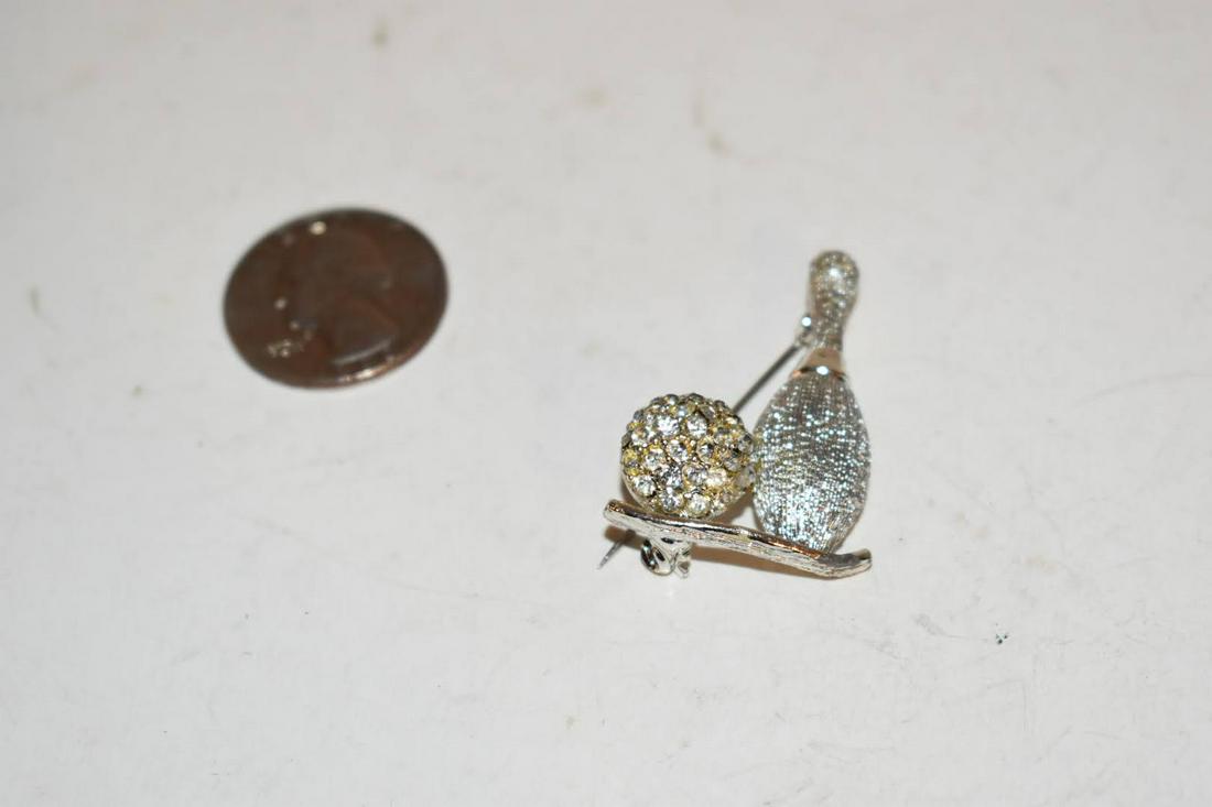 Vintage bowling silver tone Brooch: Vintage bowling silver tone Brooch Please view all photos as they are part of the description and condition of this Item, Feel free to contact me with questions or picture requests! Used Item AS IS