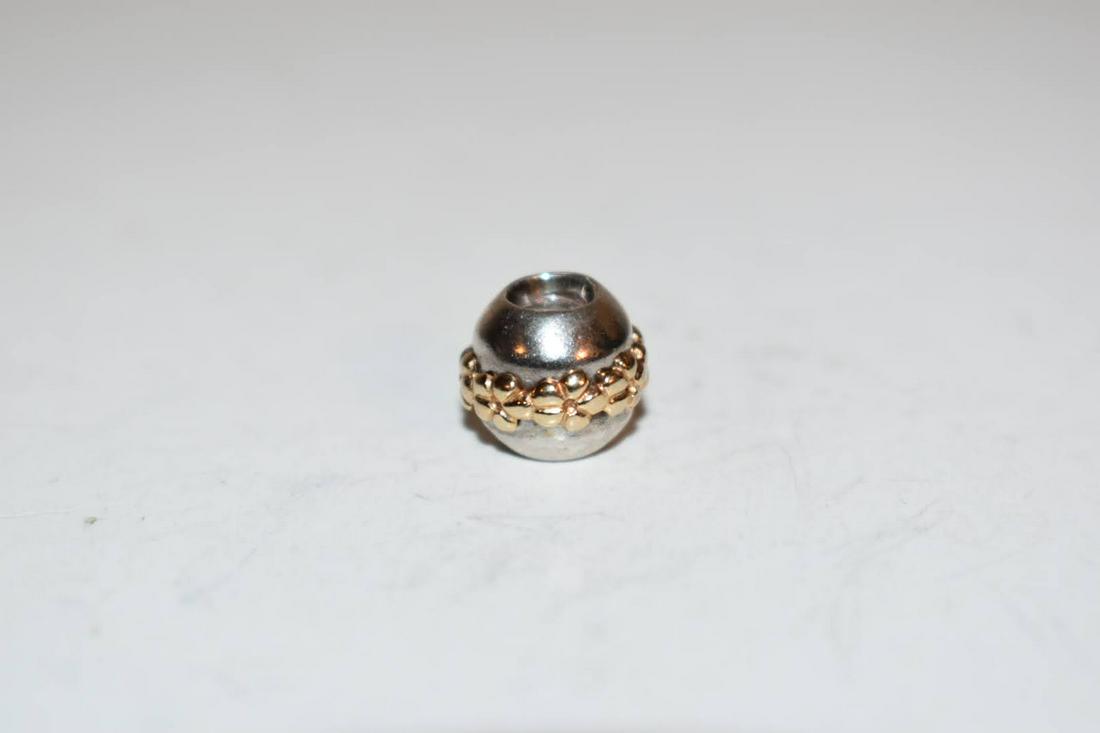 Vintage Pandora Sterling Silver 14K charm: Vintage Pandora Sterling Silver 14K charm Please view all photos as they are part of the description and condition of this Item, Feel free to contact me with questions or picture requests! Used Item A