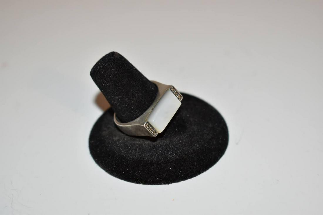 vintage sterling silver Mother of pearl marcasite ring sz 8: vintage sterling silver Mother of pearl marcasite ring sz 8 Please view all photos as they are part of the description and condition of this Item, Feel free to contact me with questions or picture req